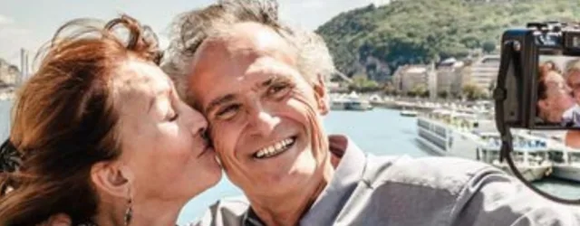 Retired Couple on Vacation Taking A Selfie