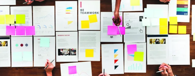 Business setting- documents on table during meeting