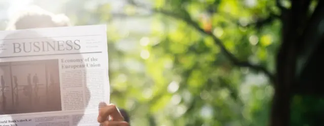 Man reading newspaper